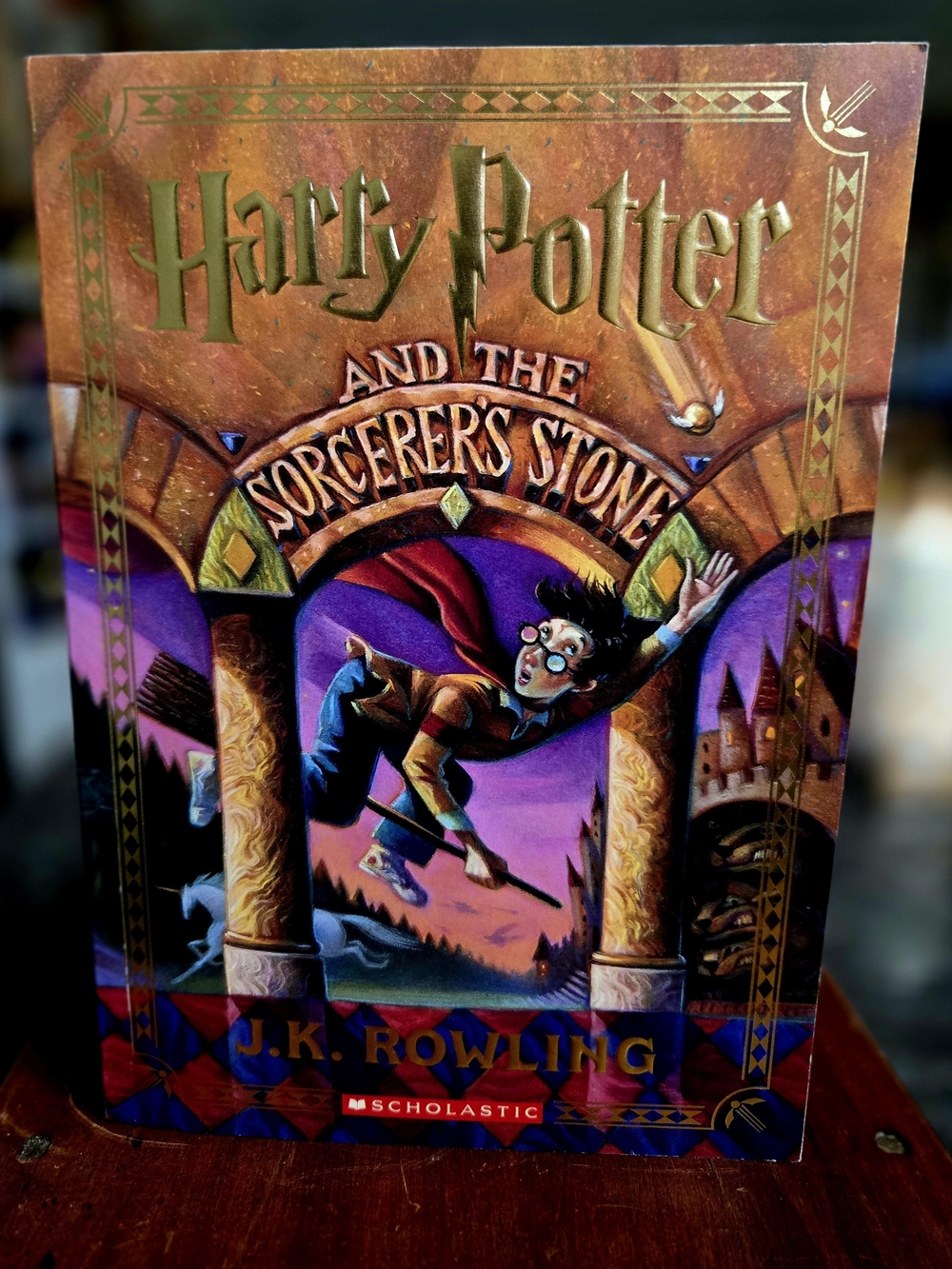 Scholastic Harry Potter and the Sorcerer's Stone - Gold, Purple, Red, Blue